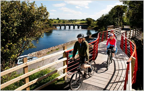 Family cycling on the Great Western Greenway at Burrishoole