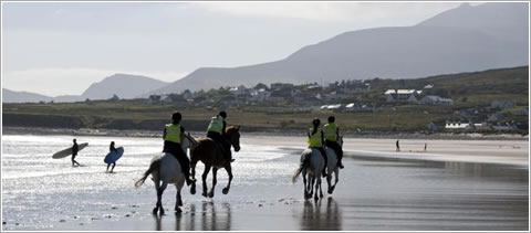 Horseriding and surfing at Keel Strand, Achill Island
